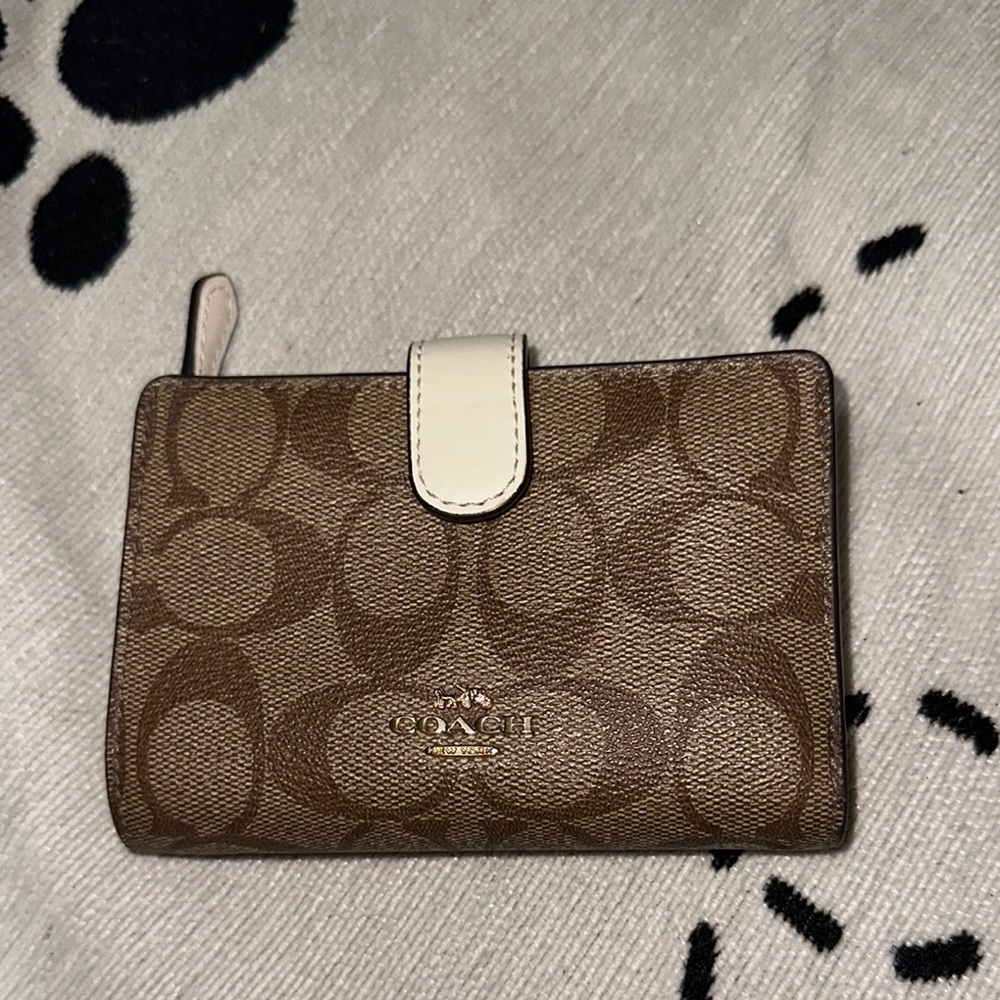 Coach Brown and tan coated canvas with white and brown leather accents Wallet
